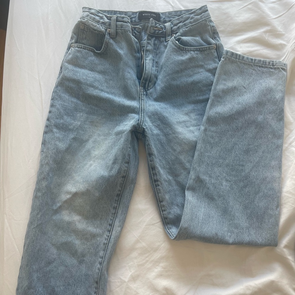 White fox boyfriend jeans- no rips which is rare lol size small